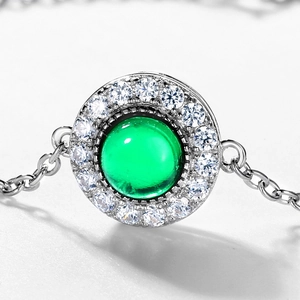 Exquisite S925 silver bracelet featuring a large lab-grown emerald with diamond halo
