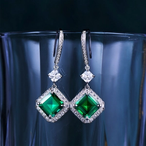 Elegant S925 silver halo drop earrings featuring square emerald stones on a glass rim