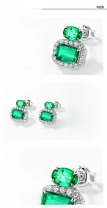 Macro detail of emerald cut green gemstone earrings with S925 sterling silver settings