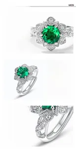 Macro view of S925 silver ring featuring emerald cut stone and floral diamond setting