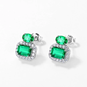 Luxurious S925 silver stud earrings with emerald cut green gemstones and halo diamonds