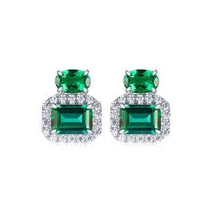 Luxurious S925 silver stud earrings with deep green emerald stones and zircon accents