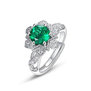 Vintage S925 silver adjustable ring with a floral emerald green stone cluster