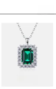 Close-up of emerald-cut green gemstone pendant with S925 silver halo setting