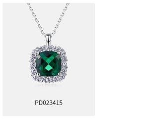 Detail of square lab-grown emerald pendant with a halo of white stones on S925 silver chain