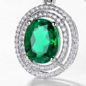 Exquisite S925 sterling silver oval lab-grown emerald pendant with halo zircon setting