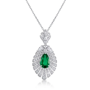 Pear-cut emerald pendant necklace with a vintage fan-shaped diamond-studded silver base
