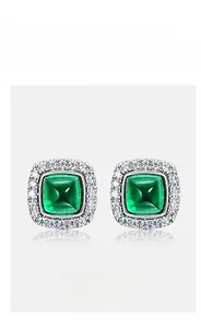 Close-up of square emerald stud earrings with micro-pave diamonds in S925 silver