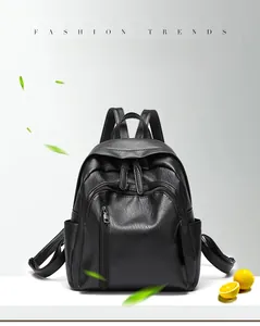 Detail of black soft PU leather backpack featuring lychee texture and vertical zip pocket