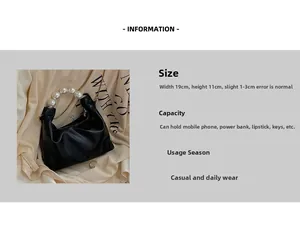 Detailed view of black pleated dumpling bag featuring luxury pearl handle and soft PU finish