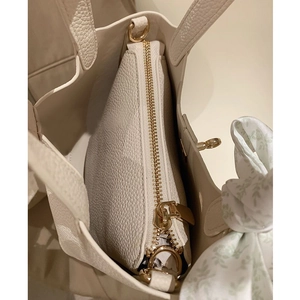Top view of cream Boston tote bag with inner zipper pocket and floral silk scarf detail