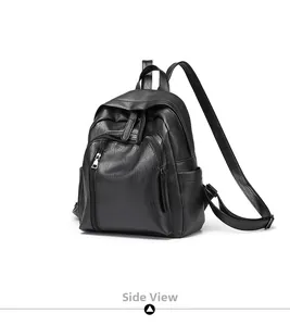 Side view of black large capacity faux leather backpack featuring pebbled texture finish