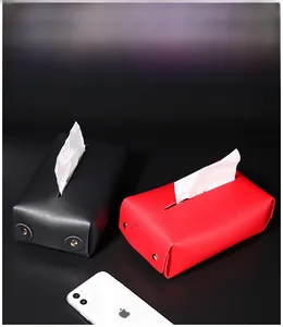 Minimalist leather tissue box covers in black and red with metal snap button details