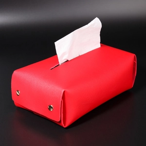 Modern red leather tissue box holder with gold snap buttons and rectangular design