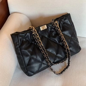 Classic black quilted leather tote bag with gold twist lock and chain shoulder strap