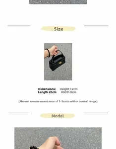 Detail of black leather handbag with golden twist lock showing size measurements