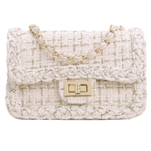 Elegant white tweed chain crossbody bag with gold hardware and classic woven texture