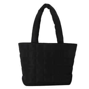 Quilted black nylon tote bag with puffer diamond pattern and wide shoulder straps