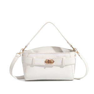 White lychee leather Kelly style handbag with gold buckle and adjustable strap
