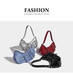 Detail view of Y2K crescent bags in silver, red, denim, and black with metal studs