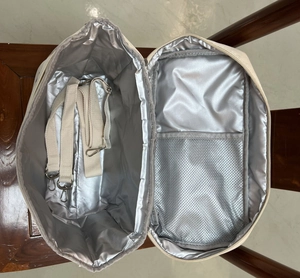 Detail view of insulated bear bag with thermal foil lining and detachable strap