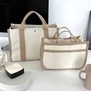 Grande borsa mamma in tela beige con manici kaki per ufficio e viaggi di alta qualità