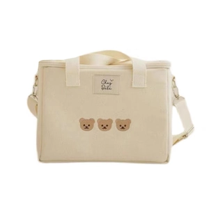 Canvas diaper bag with brown bear embroidery and adjustable strap in beige