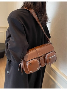 Vintage brown multi-pocket faux leather shoulder bag with industrial silver metal details