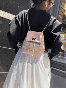 Pink tweed and leather mini backpack with chain strap and butterfly clasp for women
