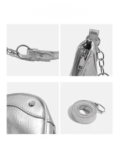 Close-up of metallic silver bag details showing metallic texture and hardware