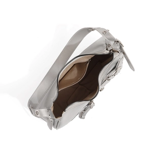 Interior view of grey shoulder bag showing silver zipper pocket and spacious main compartment