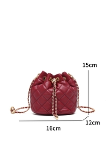Macro detail of red quilted bucket bag with gold chain and size 16cm x 15cm x 12cm
