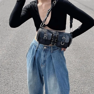 Black PU cylindrical crossbody bag with multi-pockets and metal rings on street model