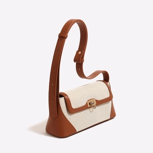 Borsa baguette vintage in tela crema e pelle marrone con chiusura in metallo dorato