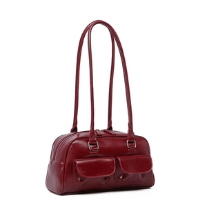 Detail shot of vintage dark red faux leather bowling bag with multi-pocket design