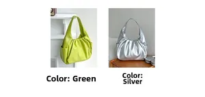 Detailed view of soft pleated croissant bags in vibrant green and metallic silver leather