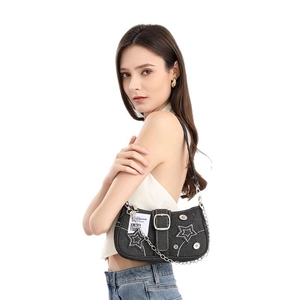 Star-patterned black denim underarm bag with silver chain and white embroidery