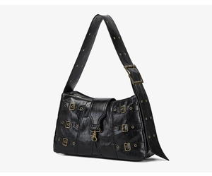 Detail view of vintage punk tote with wrinkled oil wax leather and metal buckles