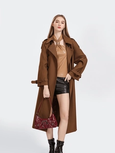 Fashionable minimalist small square shoulder bag paired with premium autumn winter outfit