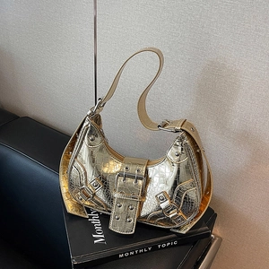 Metallic gold faux leather hobo shoulder bag featuring motorcycle buckles and rivets.