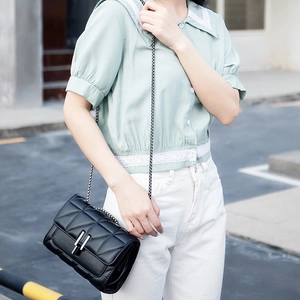 Chic black quilted chain crossbody bag for women with elegant silver metal clasp
