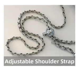 Detail of adjustable silver chain strap with grey leather weave and quilted metal ball