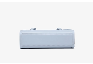 Detailed bottom view of the light blue handbag showing precise stitching and PU leather texture