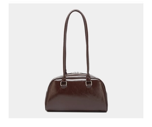 Polished dark brown oil wax leather bowling bag with twin straps and silver metal rings