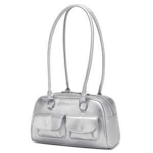 Detail view of metallic silver shoulder bag with double pockets and smooth zipper closure
