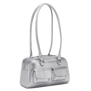 Macro shot of silver oil wax leather handbag with dual front flap pockets and metallic finish