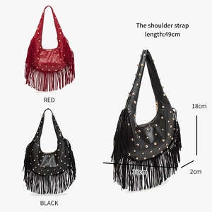 Detailed view showing dimensions and long tassel accents on a studded hobo bag