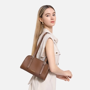 Brown leather shoulder bag with white contrast stitching and gold fashion embossing