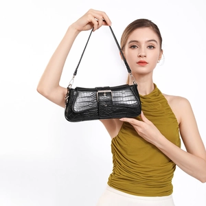 Classic black crocodile pattern baguette bag with silver buckle and shoulder strap