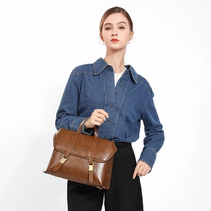 Vintage dark brown faux leather briefcase backpack with classic buckle straps